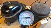 Vacuum from a 12v tyre inflator?  |  I have a need to create a slight vacuum and I have one of those cheap,  12v car...