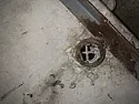 cement laundry sink leaks at drain |  The image from the top appears to show that the drain doesn't sit tight on...