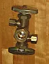 Is there such a valve? | http://www.brasscraft.com/Products.aspx?Id=204http://www.homedepot.com/h_d1/N-5yc1vZ1xlr/R-100090216/h_d2/ProductDisplay?langId=-1&storeId=10051&catalogId=10053