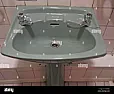 Removing head from 1970's bathroom tap |  I'm 99% sure this is the right answer.  Of course, even with the grub screw...