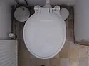 Using flexible connector to connect toilet to outlet pipe which is  not directly behind toilet? | &laquo; previous thread