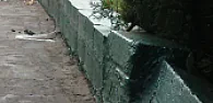 How to repair Cinder Block Long driveway wall that has a break in it |  Hi HOH People:  We have a long (circa 100 feet) low lying cinder block wall...