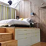 Tool storage moving house to flat  |  How about a raised bed platform, to take advantage of the high ceilings?...
