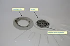 Simple shower basin leak question  |  The ring around the plug hole has been a bit loose ever since I've been in...