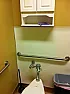 restroom plastic splashback peeling off |  Hi, our office restroom white plastic splashback is peeling off thewall. It was...