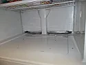 Water dripping into refrigerator section from the freezer above  |  I have a 14-year-old Kenmore 106.68862891 top freezer refrigerator, with no ice...