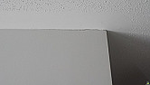 Cracks where wall meets ceiling