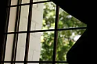 I took out a full lenth window screen and can't get it back in. Can someone help me? | No further details provided