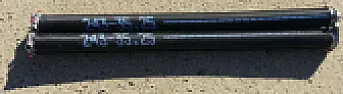 Garage door torsion spring broken ... and ... I have no questions!     :)  |  Yes, it's a torsion spring, so, AFAIK, there's nothing to "tie". (Maybe...