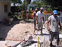 breaking up concrete (or cement?) with a sledgehammer.  |  Concrete is strong in compression, but quite weak in tension (if there's no ...