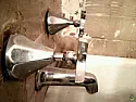 How do I remove old Kohler bathtub faucet handles to install a tub surround. | &laquo; previous thread