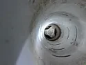 Clothes wrapped around agitator Kenmore compact washer model 110.42722200 |  My washing machine is Kenmore model 110.42722200. It has a screw in the side...