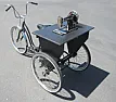 made a little sewing machine table  |  The sewing machine is an old hand-cranked Singer, the trike an old Schwinn. ...