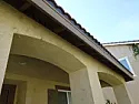 house stucco: What are these dark grey splotches?  | &laquo; previous thread