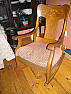 Rocking chair rocks back too far