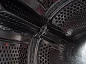 How do I get a shirt out of the bottom of my washing machine? It's clogging the machine? | &laquo; previous thread