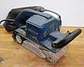 cutting straight edge in wood with dremel  |  I've got a cabinet in the laundry room (see pics) where I want to cutoff...