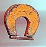 How to partly demagnetise a magnet ? |  Think of a horseshoe magnet as favoured in Road Runner and Bugs Bunnycartoons....