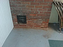 80 year old clay brick in near chimney clean out in basement , need to seal this