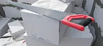 How to attach wooden floor to block basement  |  In the old days, I know that when they built a concrete block basement, the...