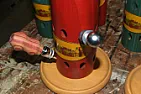 Ha!  Wood Working!  |  You mean the  bottles with all the holes?  Drilled on a DP with 45 degree...