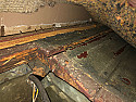 Old floor buckling by vent