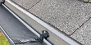 Rain bypassing gutter |  First, try to get the company that installed them to fix the problem.  Makesure...