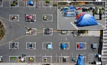 Tent.  $60,000 Each per Year  |     in San Francisco.    It works out to $164 per tent per day.   That includes...