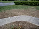 Exterior Masonry Caulking |  Had a fieldstone walkway put in recently, roughly 16' long.   It sitson 2"...