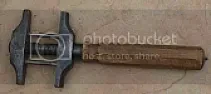 What is it? Set 394 |  2275) An adjustable wrench -- which also looks as though it could be used as a...