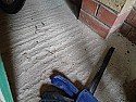 To self-level or not garage concrete floor with "grooves/waves" to convert to home office