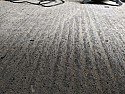 To self-level or not garage concrete floor with "grooves/waves" to convert to home office
