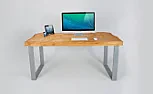 Cool desk  |  This is pretty slick.  Wonder how he creates the peaks and valleys?  CNC?...