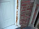 how to fix this main door?  |  Yes, there was a storm door there and some of the metal trim is still in place. ...